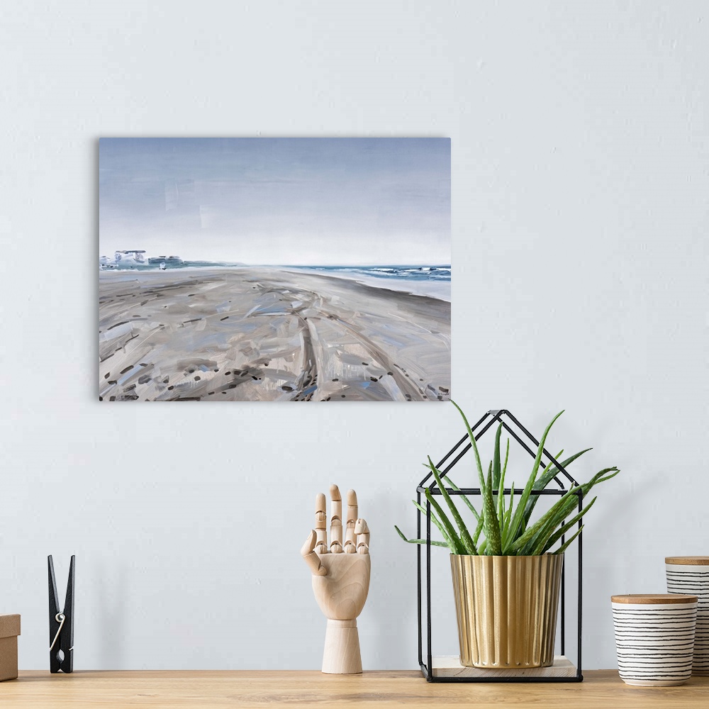 A bohemian room featuring Contemporary painting of a beach with tire tracks imprinted in the sand.