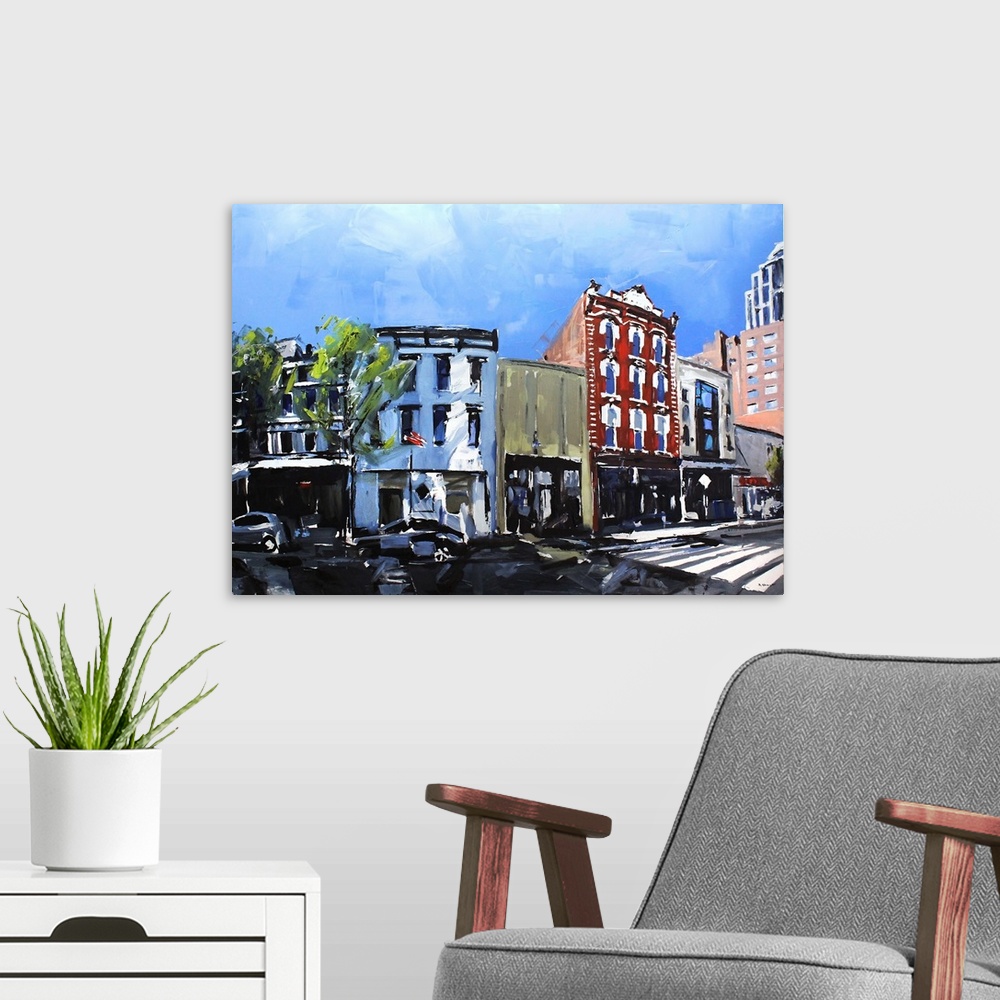 A modern room featuring Historic buildings along a downtown street in Raleigh, NC.