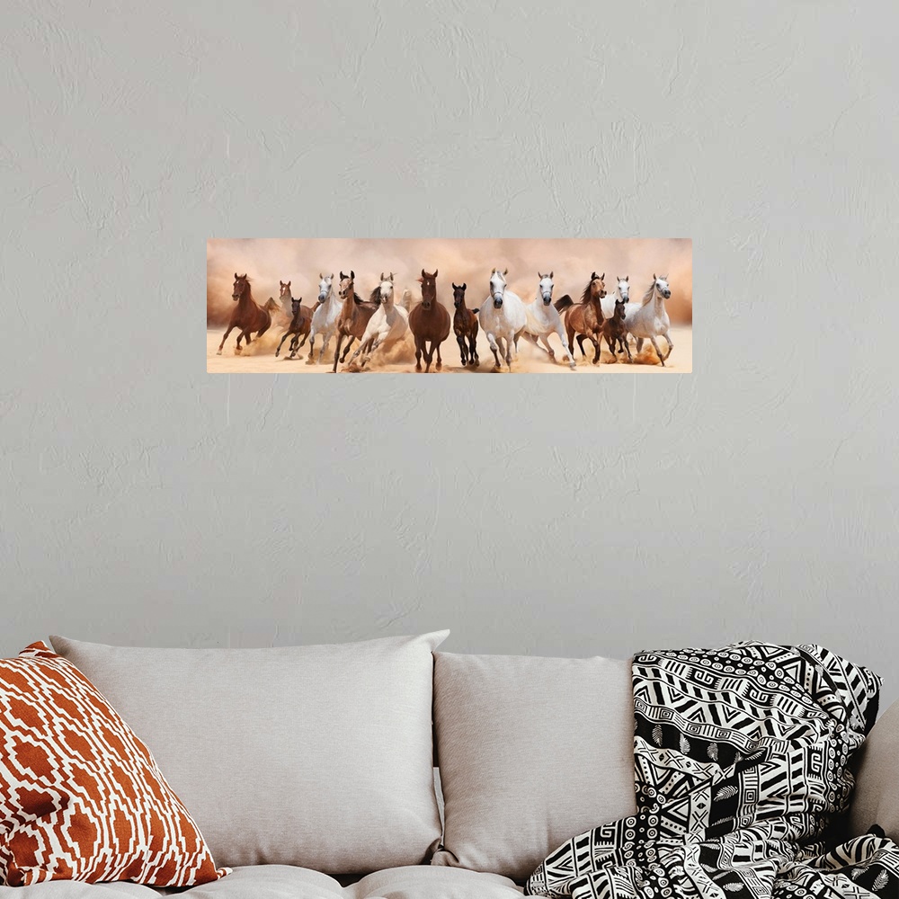 A bohemian room featuring A herd of horses running on the sand storm.