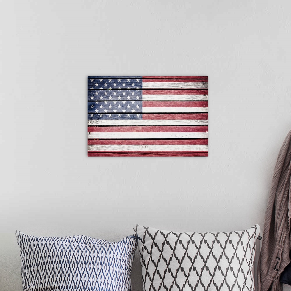 A bohemian room featuring American flag painted on old wood plank background.