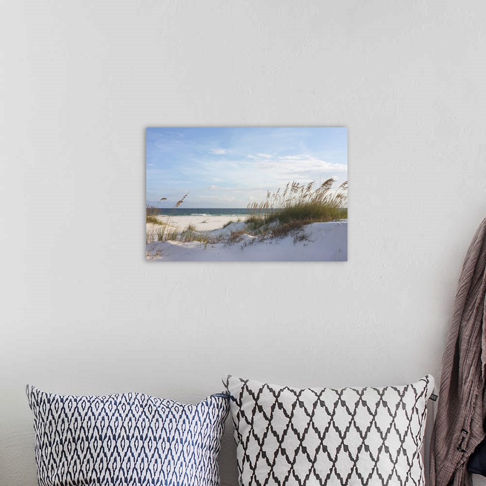 A bohemian room featuring Rosy beach with dunes at sunset in Pensacola, Florida.