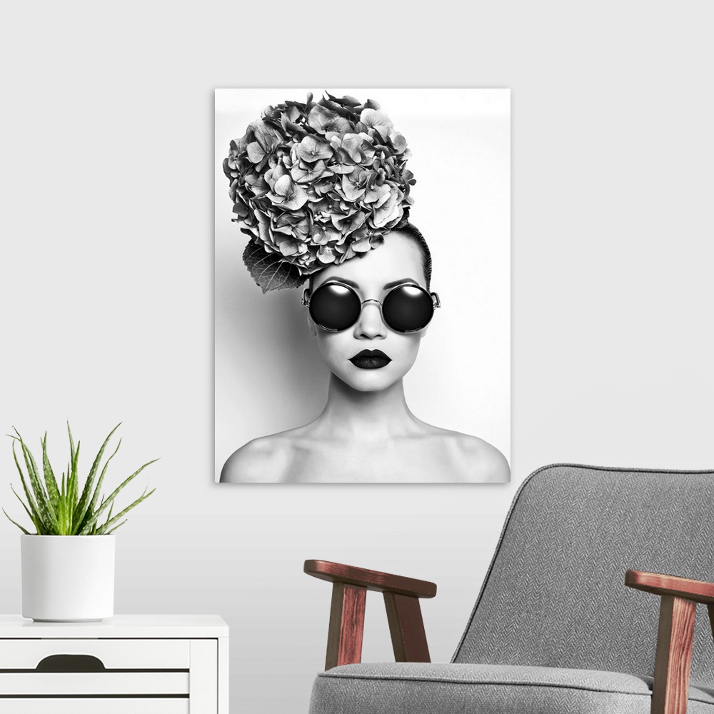 A modern room featuring Black and white portrait of beautiful lady with hydrangeas.