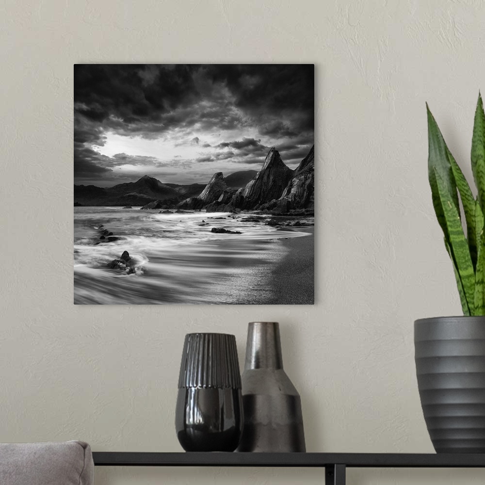 A modern room featuring Stunning mountain and sea sunset landscape black and white.