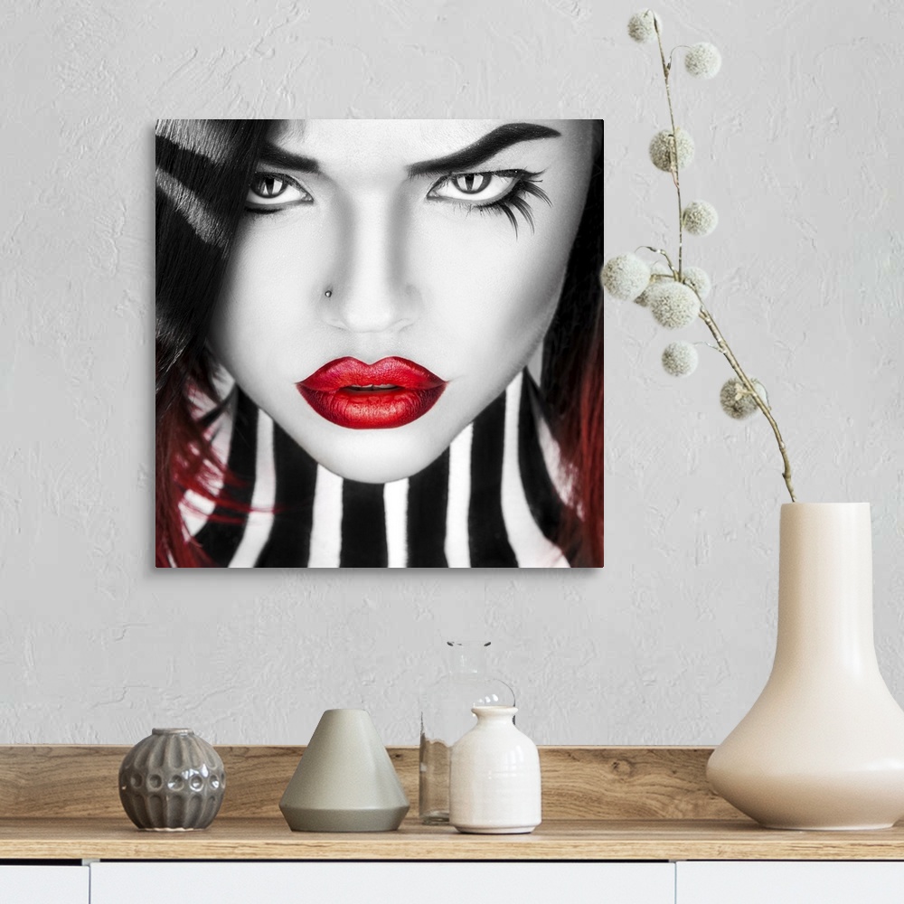A farmhouse room featuring Black and white portrait of beauty woman with red lips in studio.
