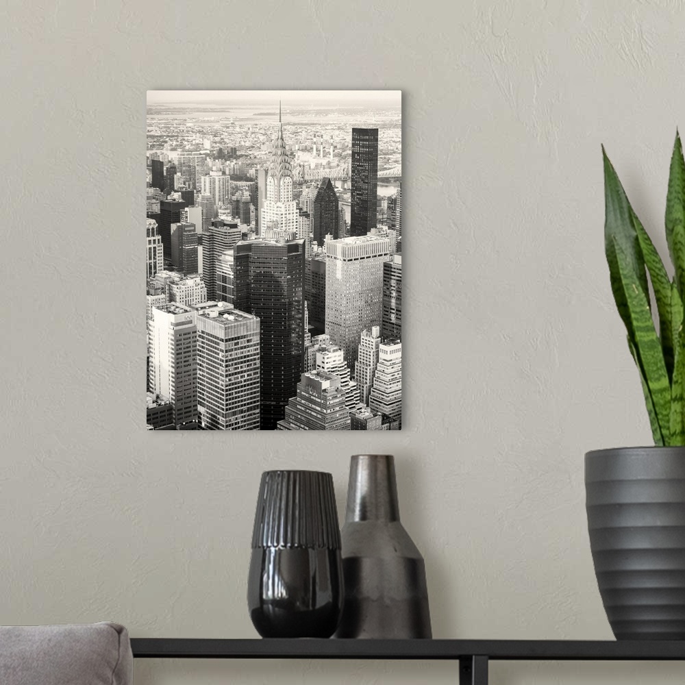 A modern room featuring Black and white view of New York city including the Chrysler building.