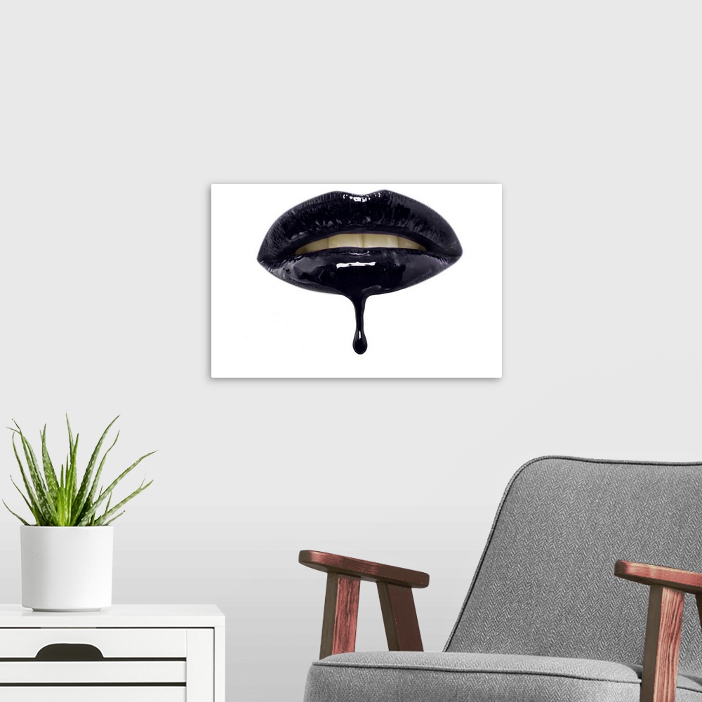 A modern room featuring Close-up of black lip-gloss dripping from woman's lips over a white background.