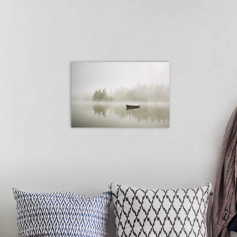 A bohemian room featuring Boat on the lake at morning fog.