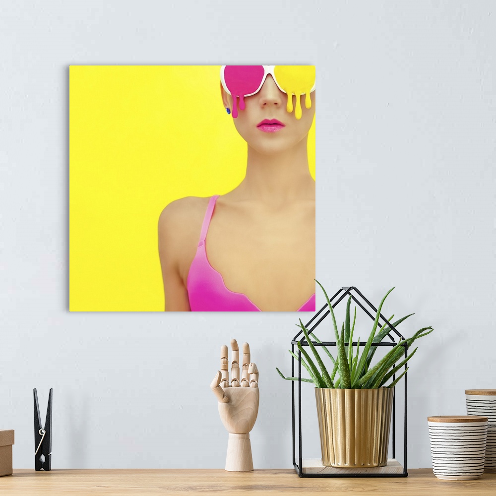 A bohemian room featuring Bright girl in exclusive colorful glasses.
