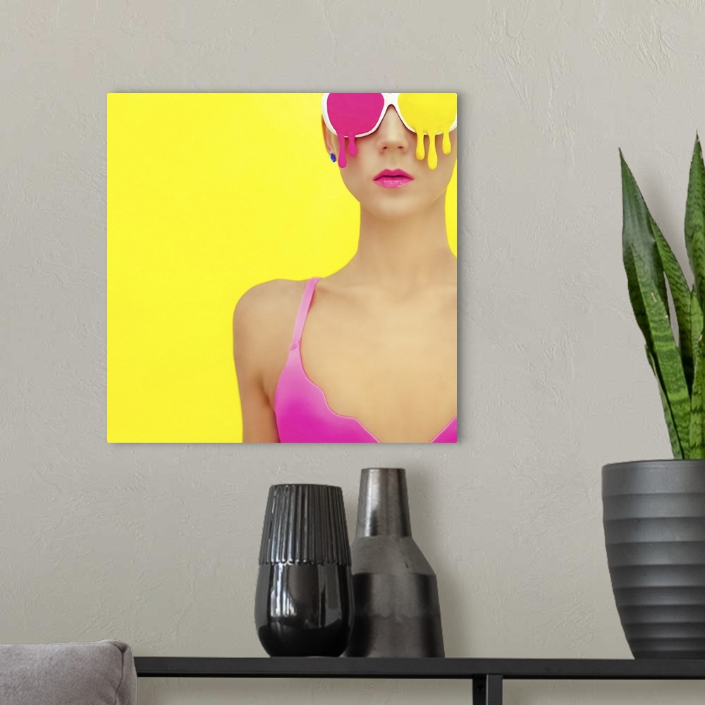 A modern room featuring Bright girl in exclusive colorful glasses.