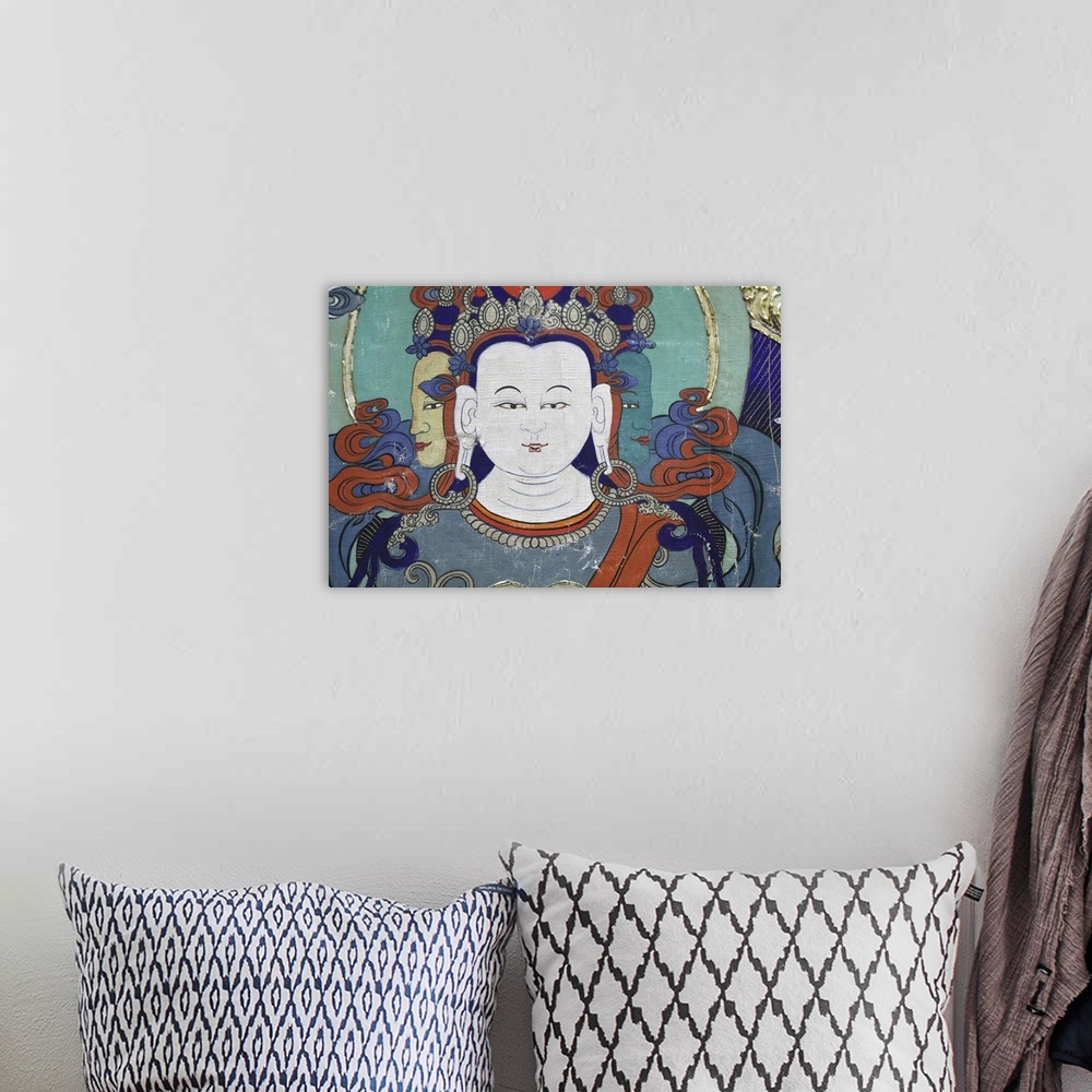 A bohemian room featuring Buddha
