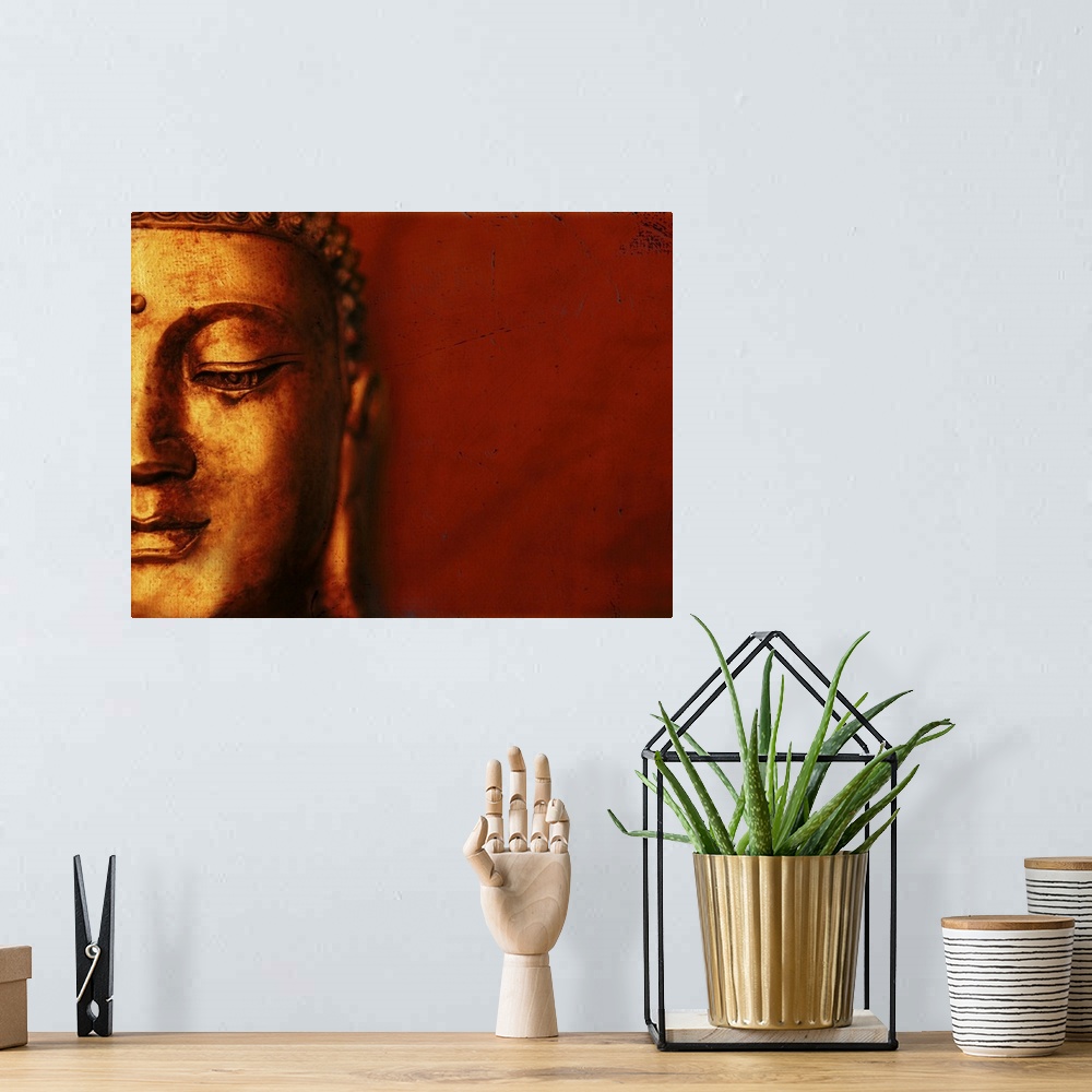 A bohemian room featuring Buddha Face With Red Background