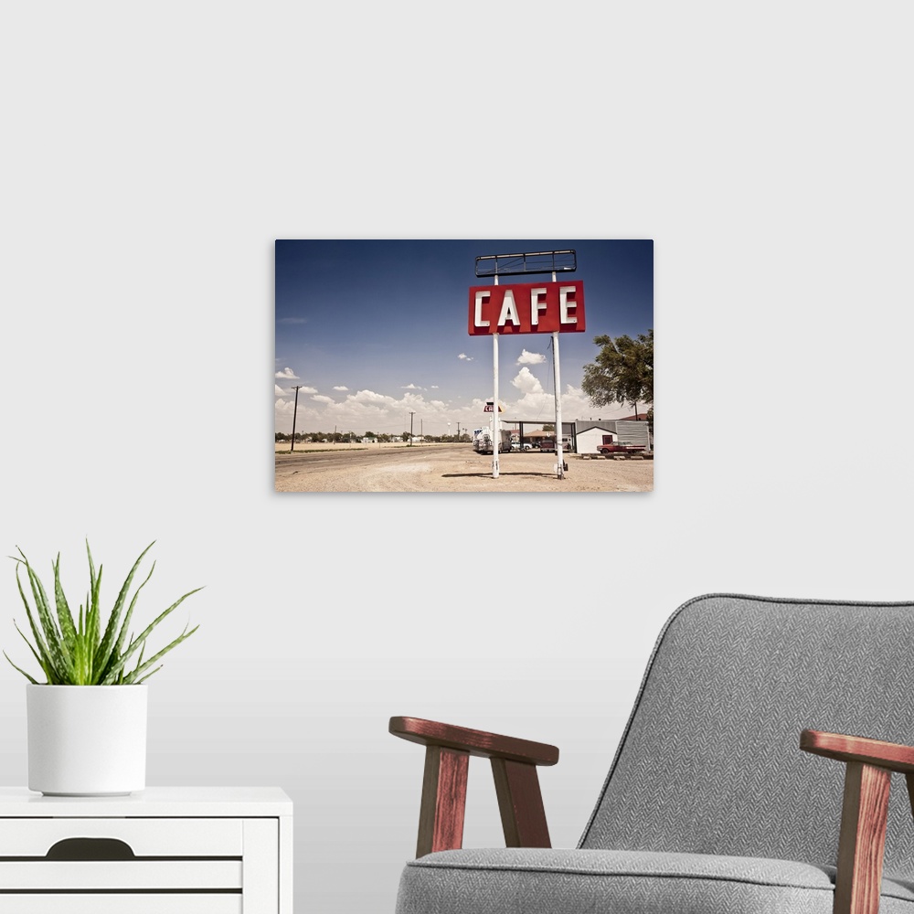 A modern room featuring Cafe sign along historic Route 66 in Texas.