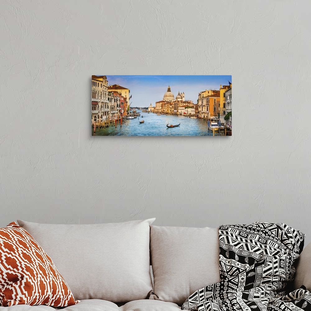 A bohemian room featuring Panoramic view of famous canal grande and Basilica Di Santa Maria Della salute in golden evening ...