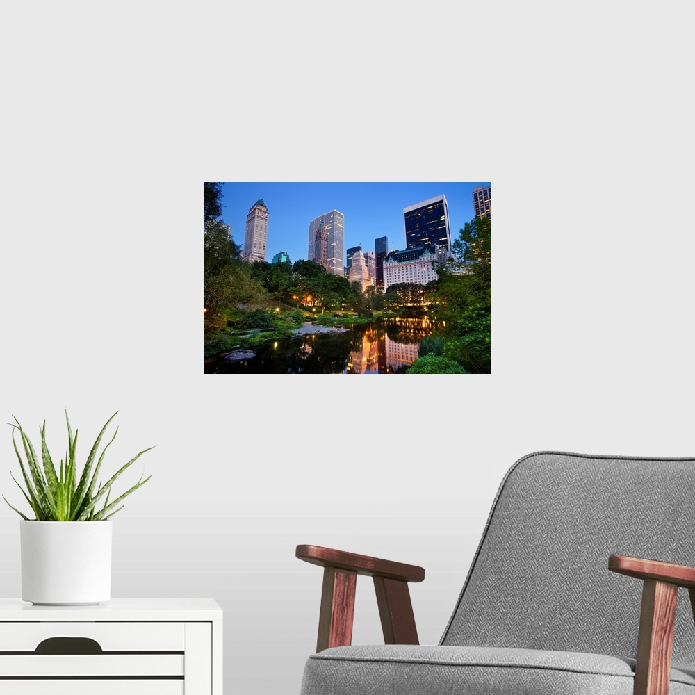A modern room featuring Image of the midtown Manhattan skyline taken from Central Park, New York City.