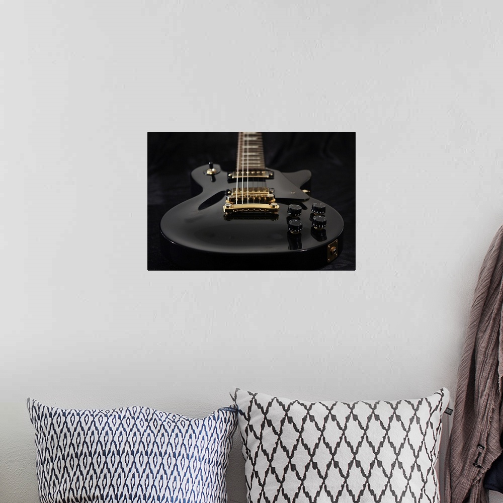 A bohemian room featuring Close Up Of Electric Guitar