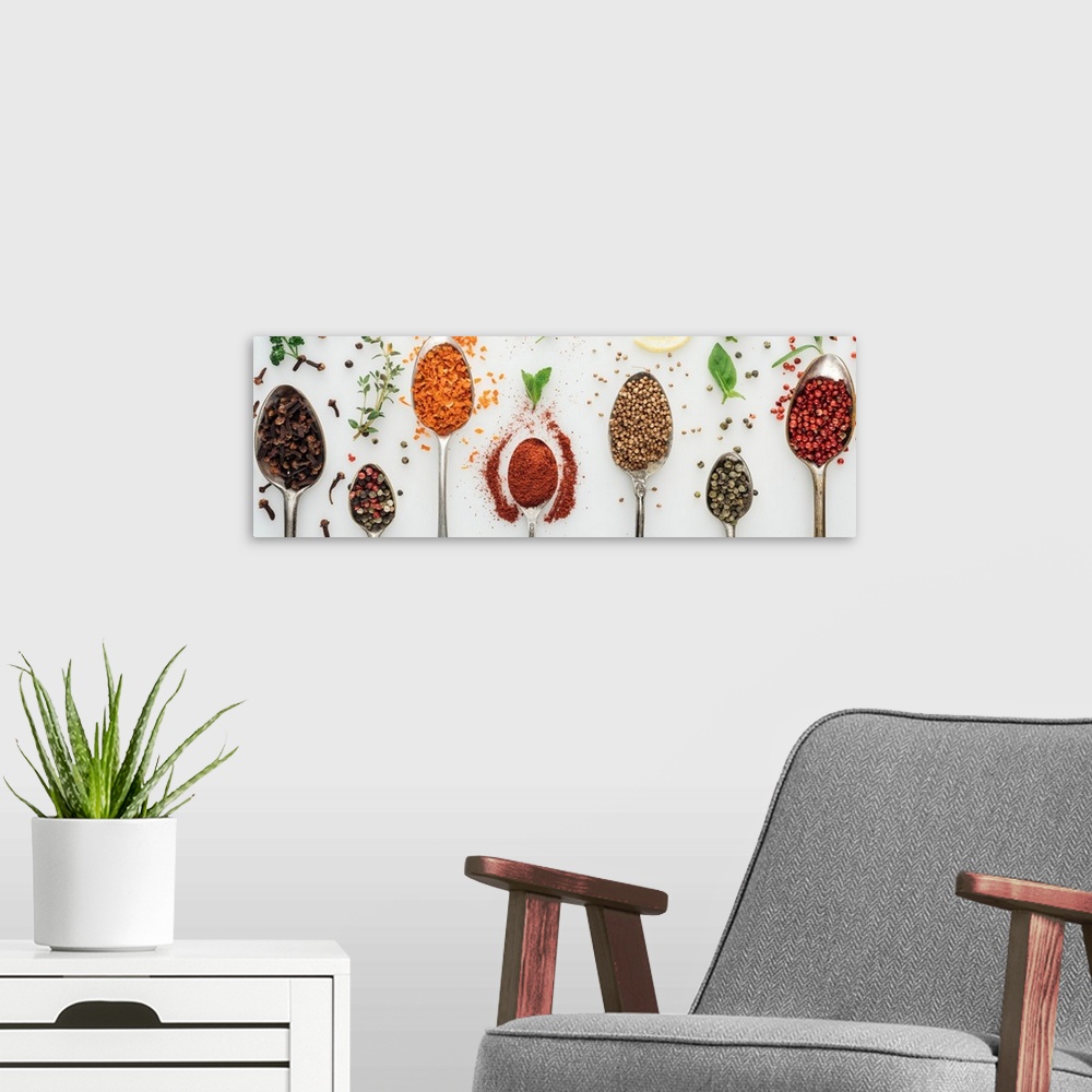 A modern room featuring Colorful Spices In Silver Spoons