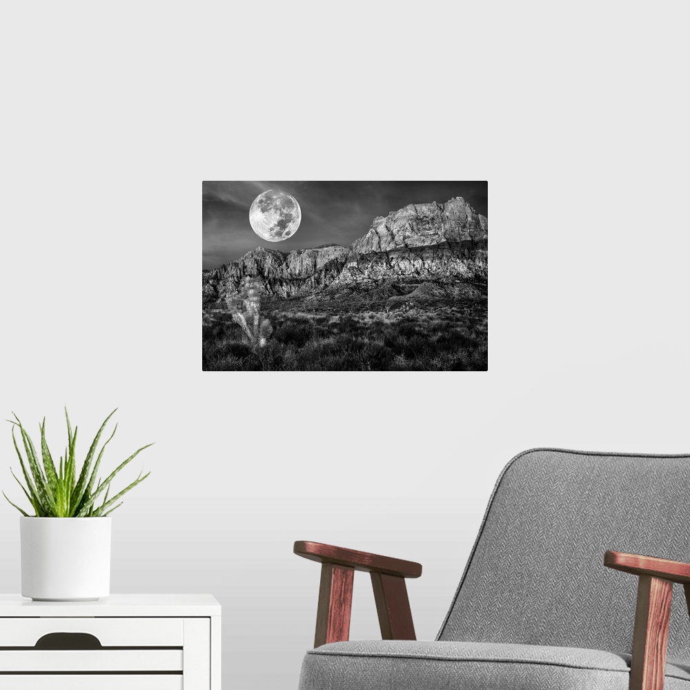 A modern room featuring Monochrome of desert mountains and Joshua trees under a full moon.