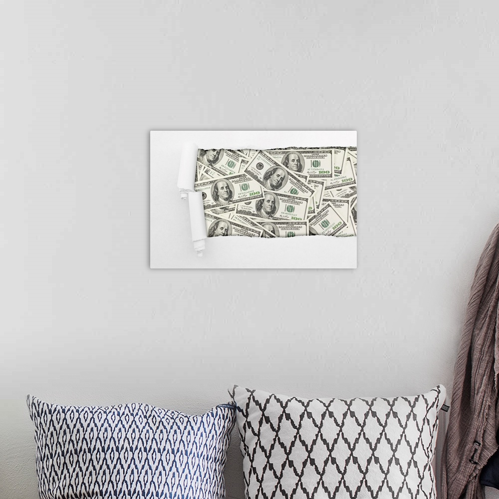 A bohemian room featuring Close-up of a hole in paper over American hundred dollar bills. Business background.