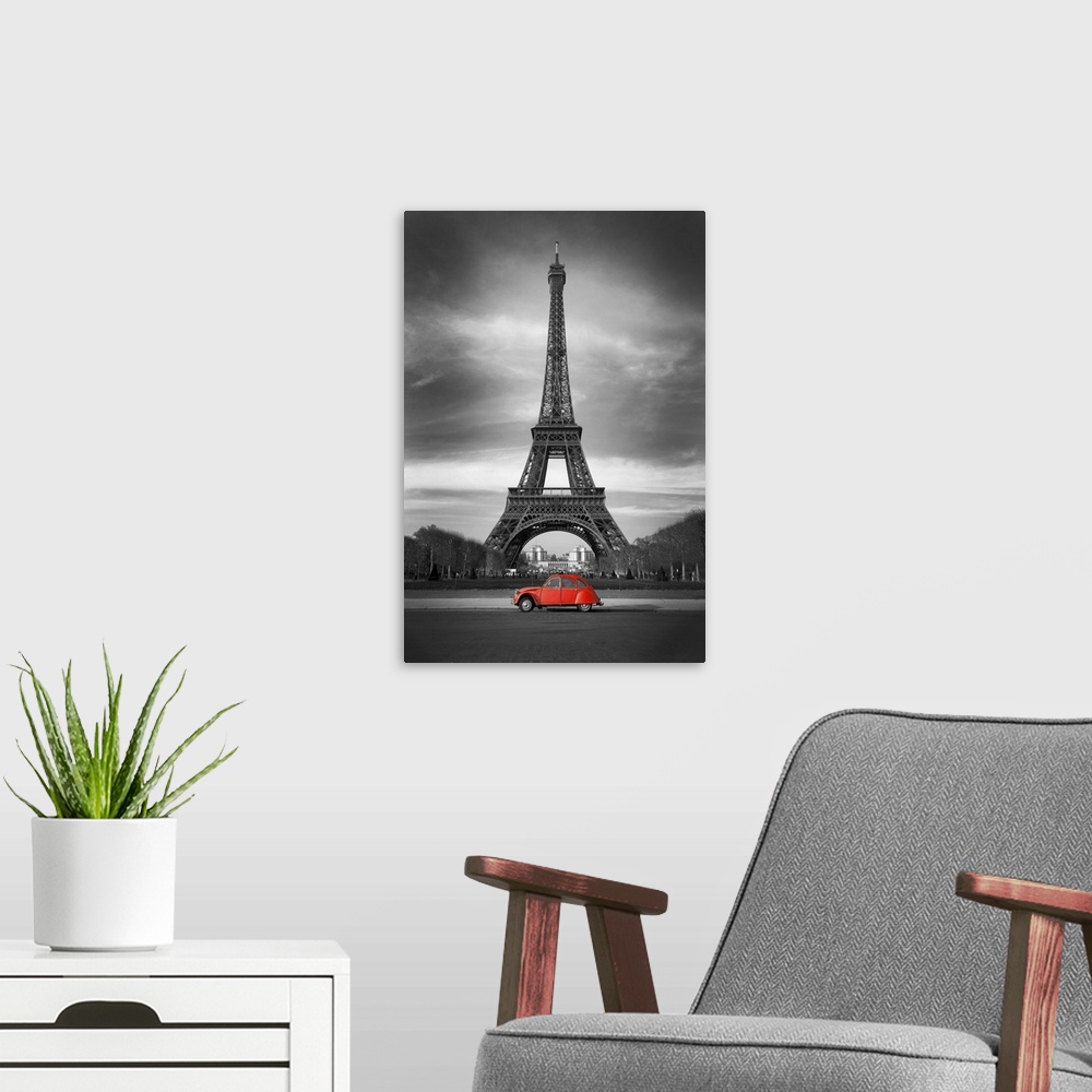 A modern room featuring Eiffel Tower and old red car in Paris.
