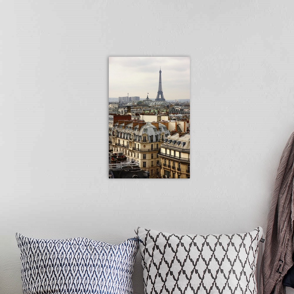 A bohemian room featuring Paris cityscape with Eiffel Tower and Great Palace.