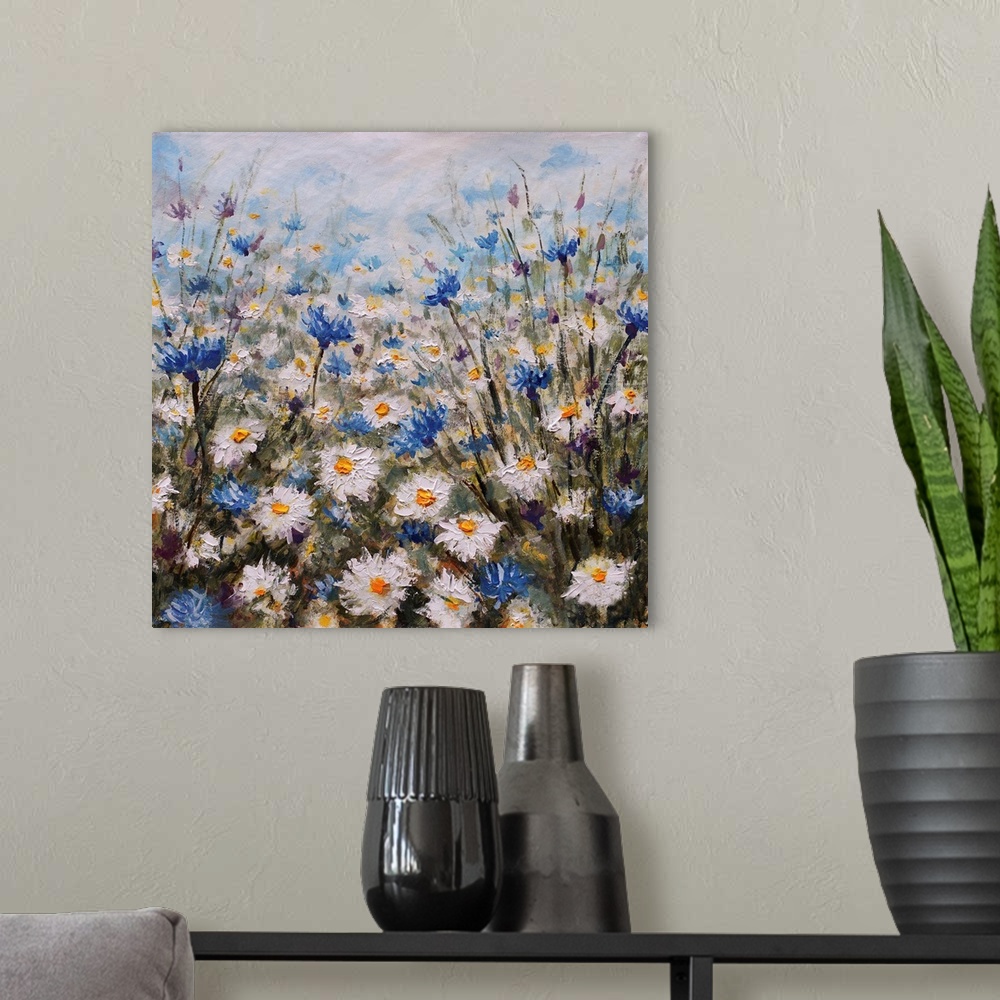 A modern room featuring Flowers. Field of white flowers. Glade of cornflowers and daisies. Summer flowers. Grass. Nature....