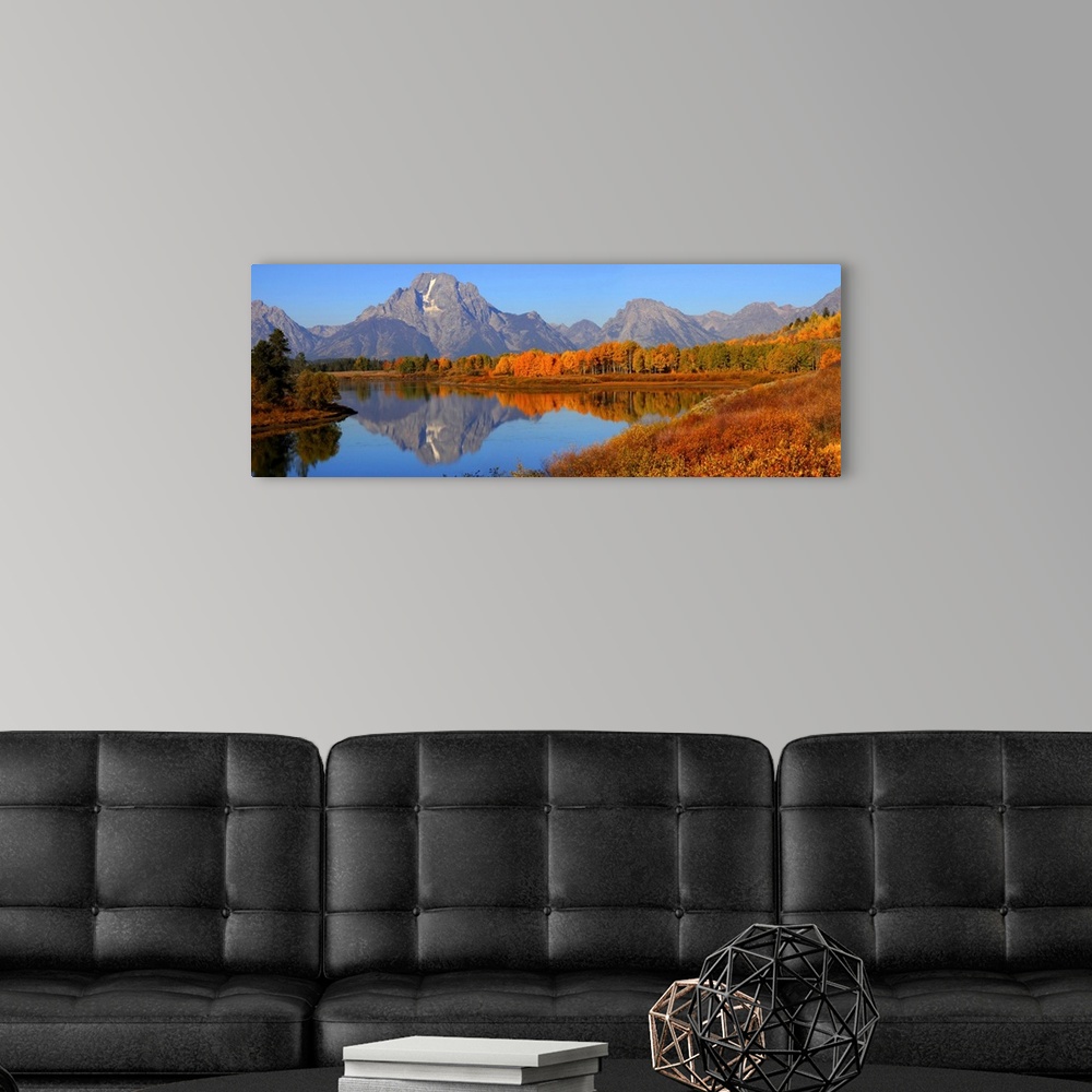 A modern room featuring Grand Tetons National Park from Oxbow bend.