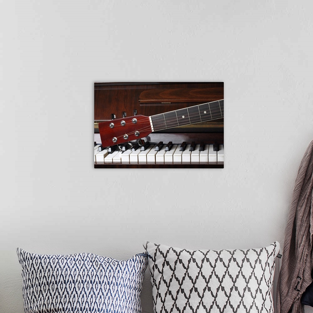 A bohemian room featuring Guitar Neck On Old Piano Keys