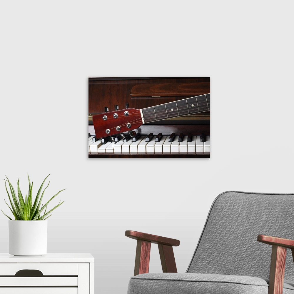 A modern room featuring Guitar Neck On Old Piano Keys