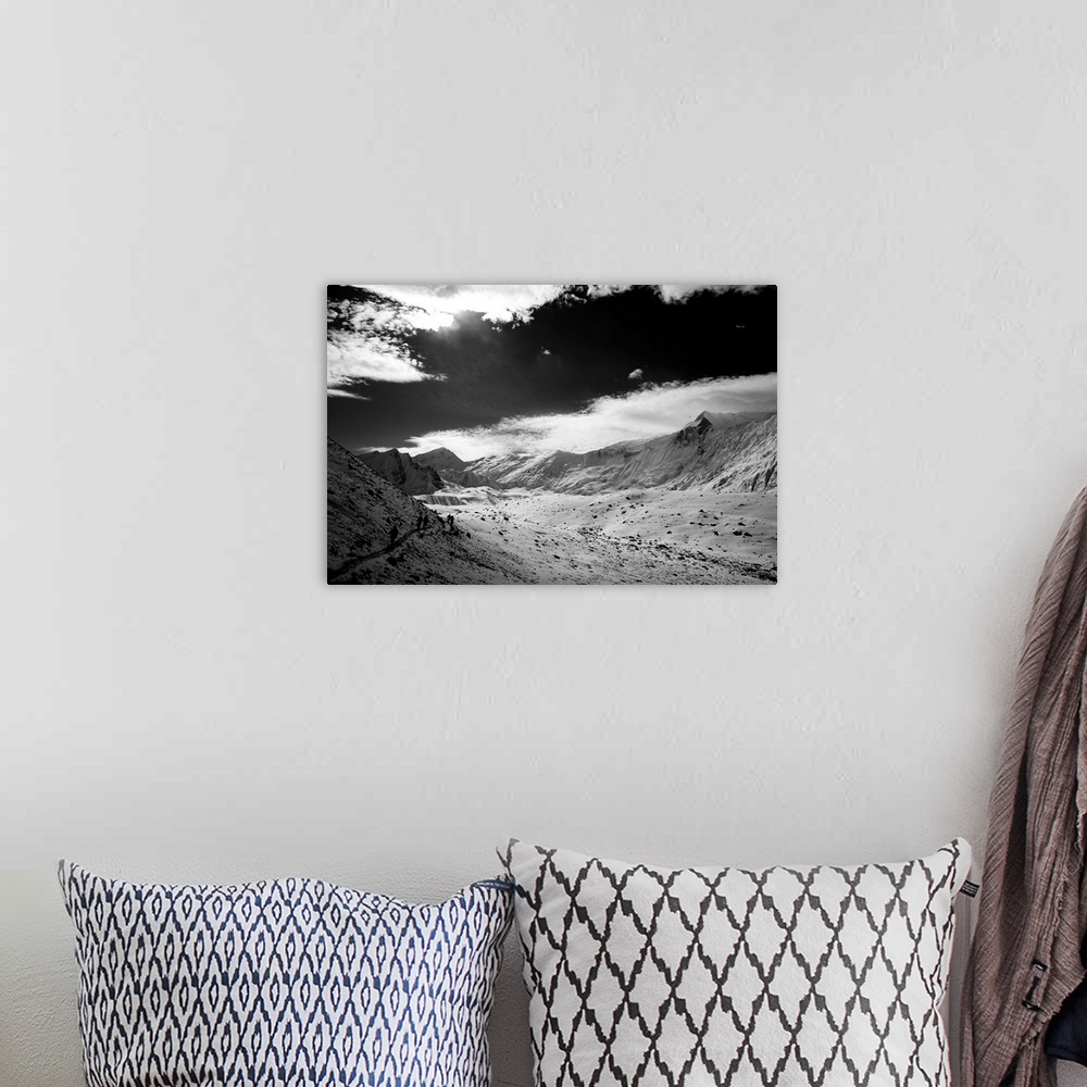 A bohemian room featuring Black and white photo of Himalayan mountains, Annapurna region, Nepal.