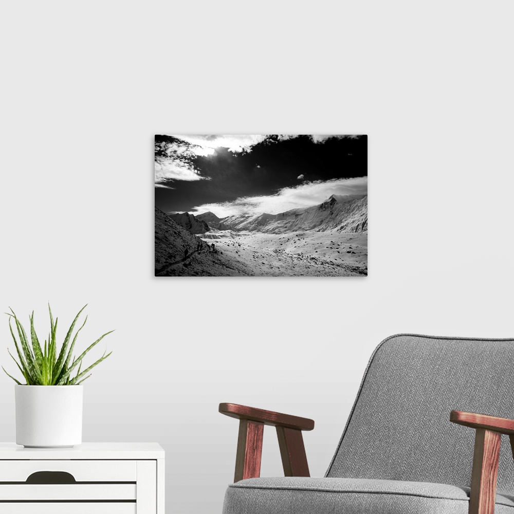 A modern room featuring Black and white photo of Himalayan mountains, Annapurna region, Nepal.