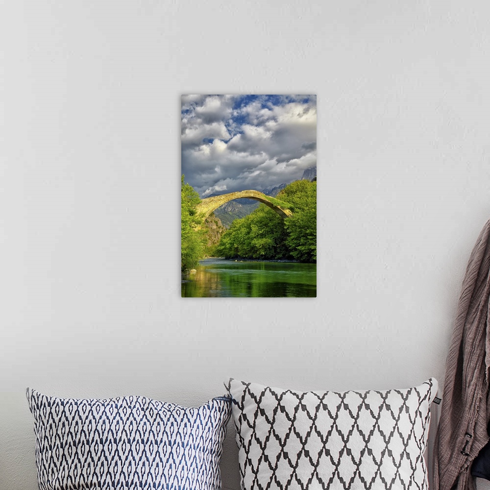 A bohemian room featuring Overcast landscape of Konitsa bridge and Aoos river, Greece.