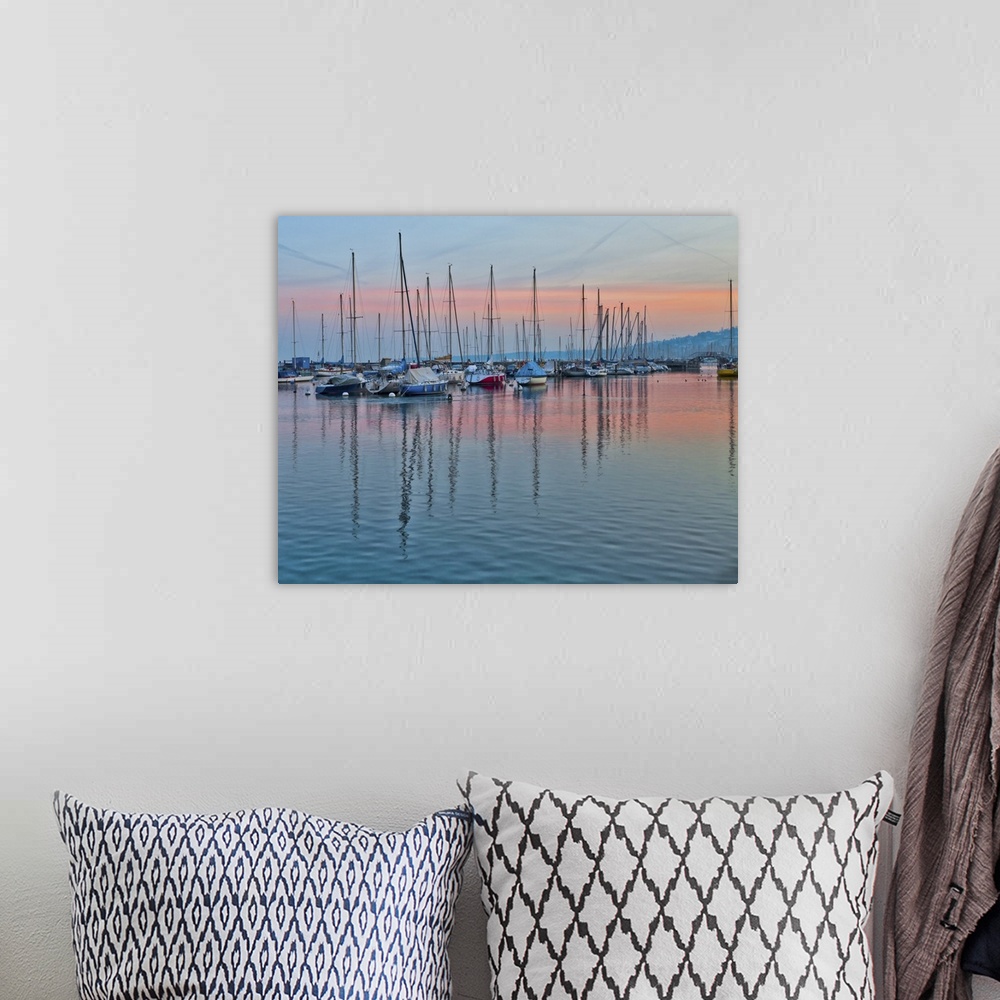 A bohemian room featuring Dawn at a marina at Lake Geneva, Switzerland.