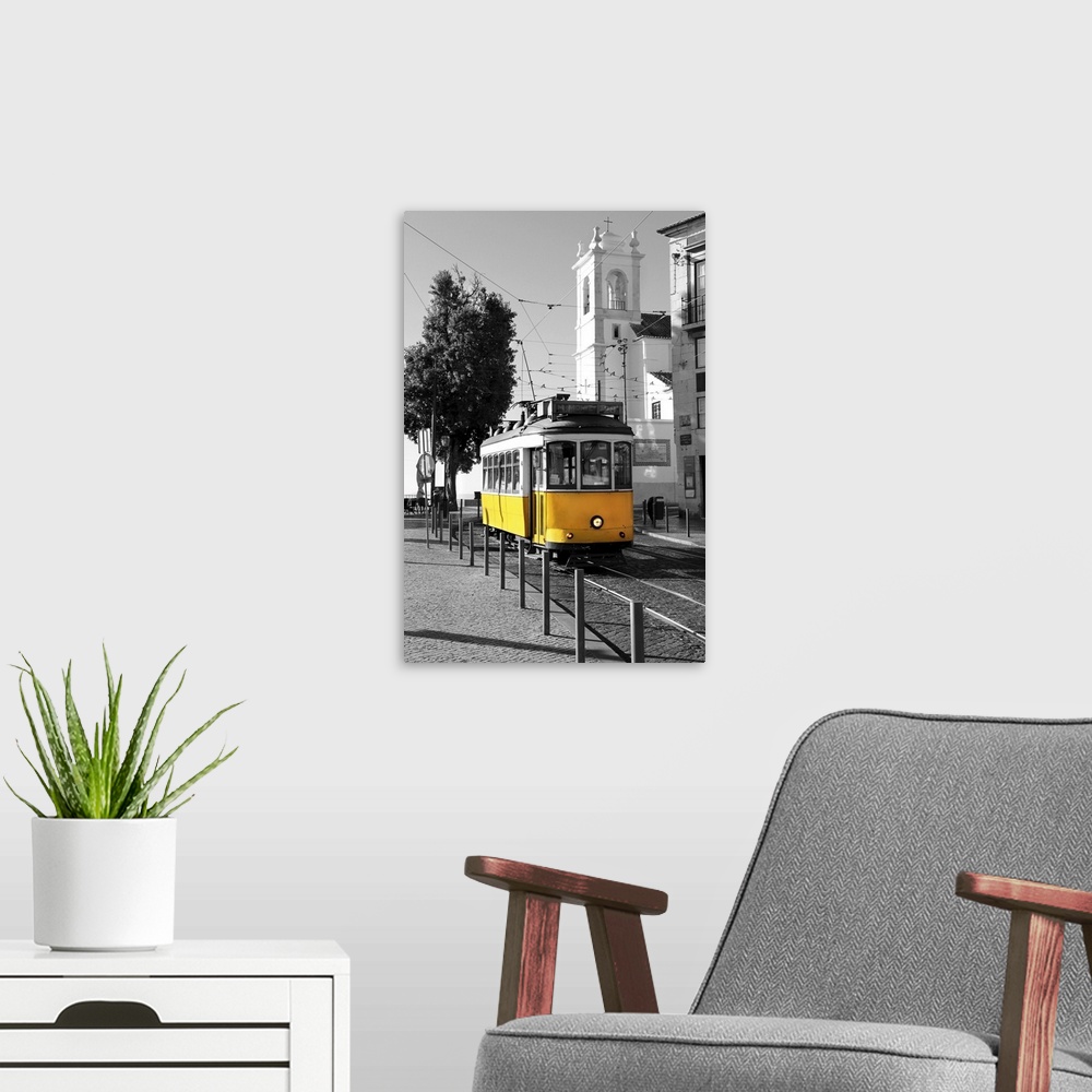 A modern room featuring Old yellow tram over black and white background in Lisbon, Portugal.