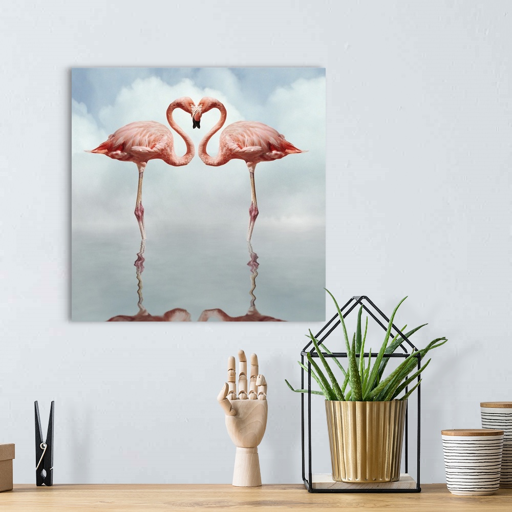 A bohemian room featuring Pink flamingos making a heart shape in reflection pond.