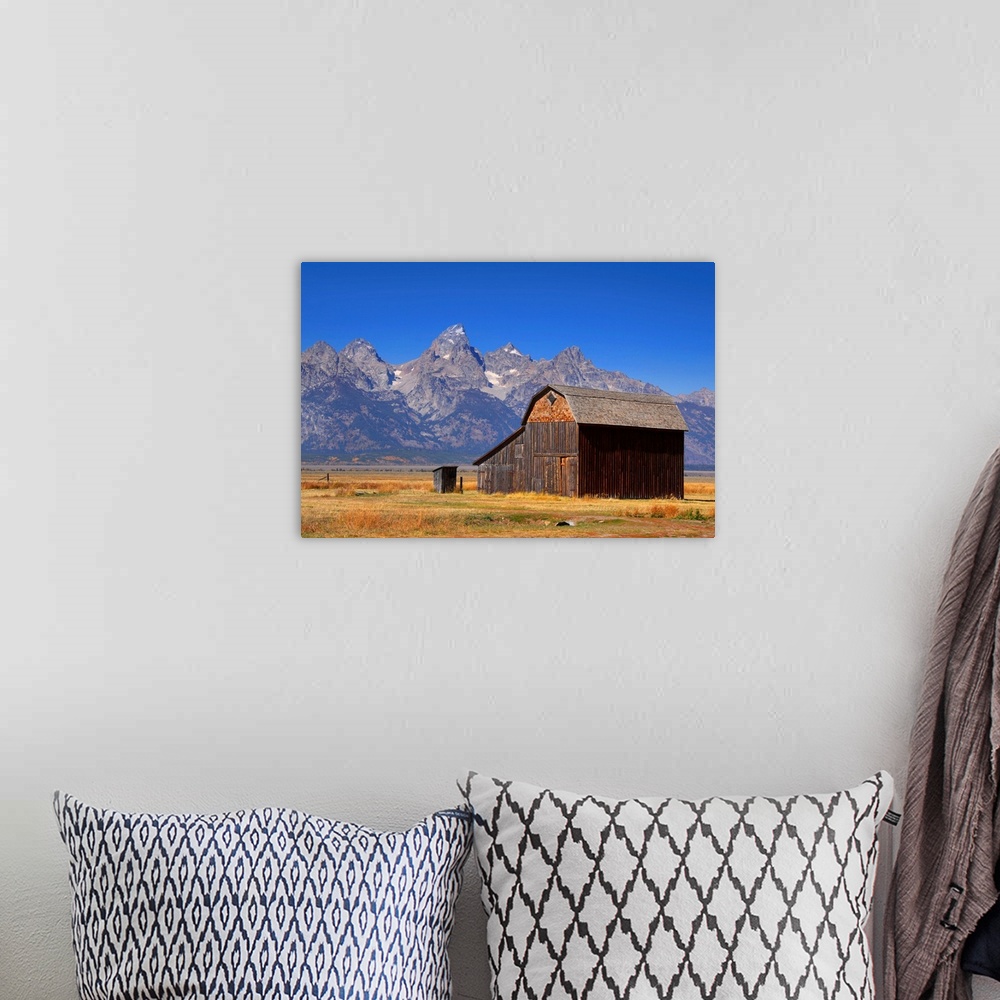 A bohemian room featuring Mormon row barns in grand Tetons national park.
