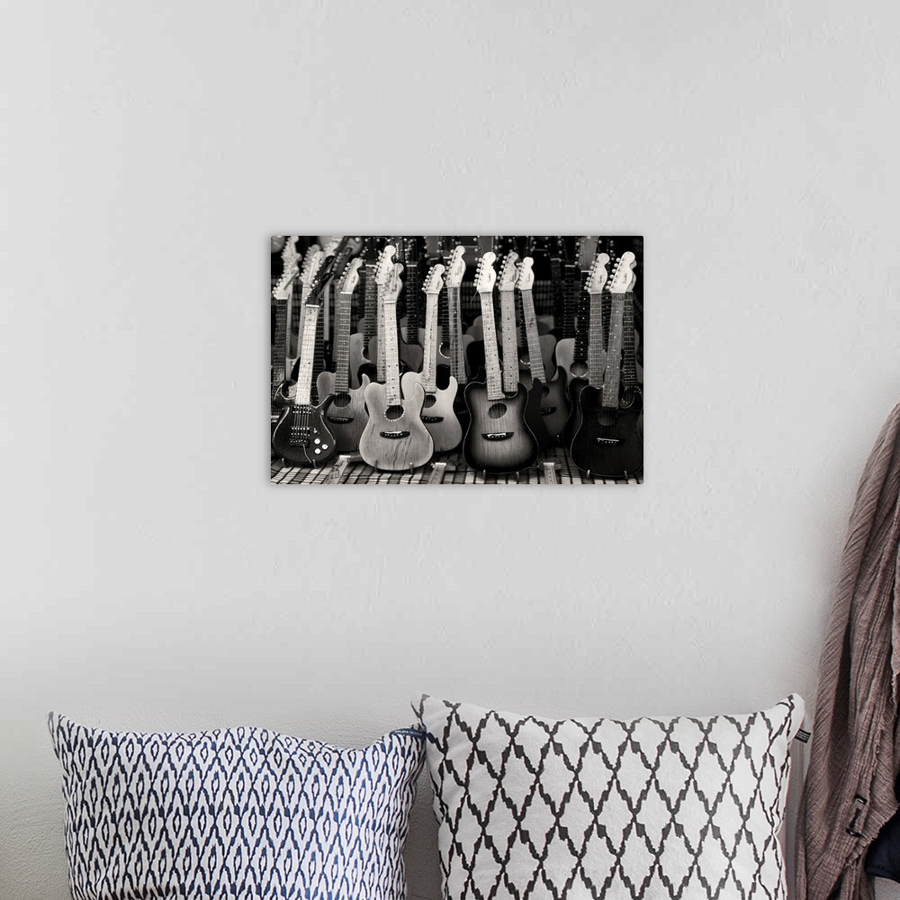 A bohemian room featuring Toy guitar background.