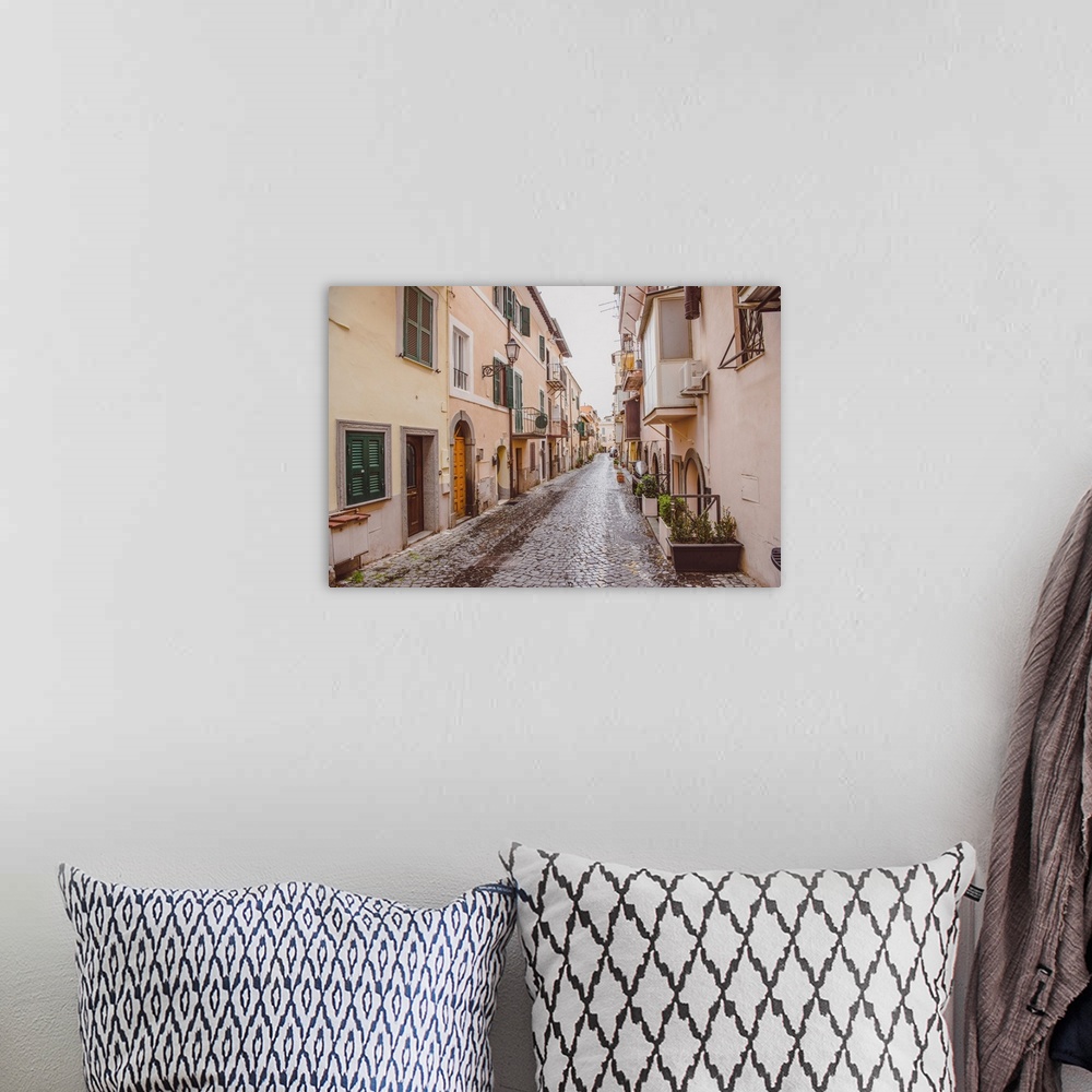 A bohemian room featuring Narrow Street With Buildings In Castel Gandolfo, Rome Suburb, Italy