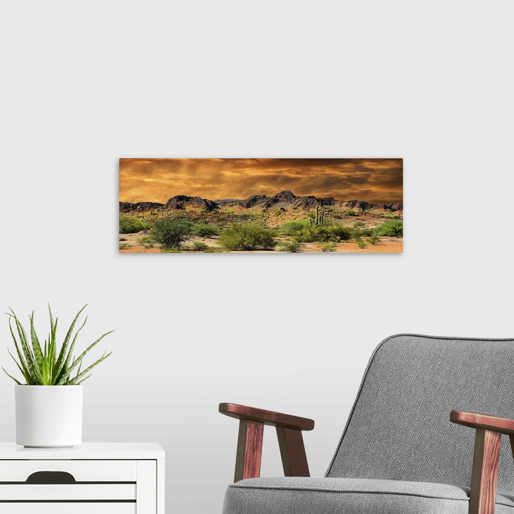 A modern room featuring Beautiful panorama of cloud formations and rocky mountains near the border of New Mexico and Mexico.
