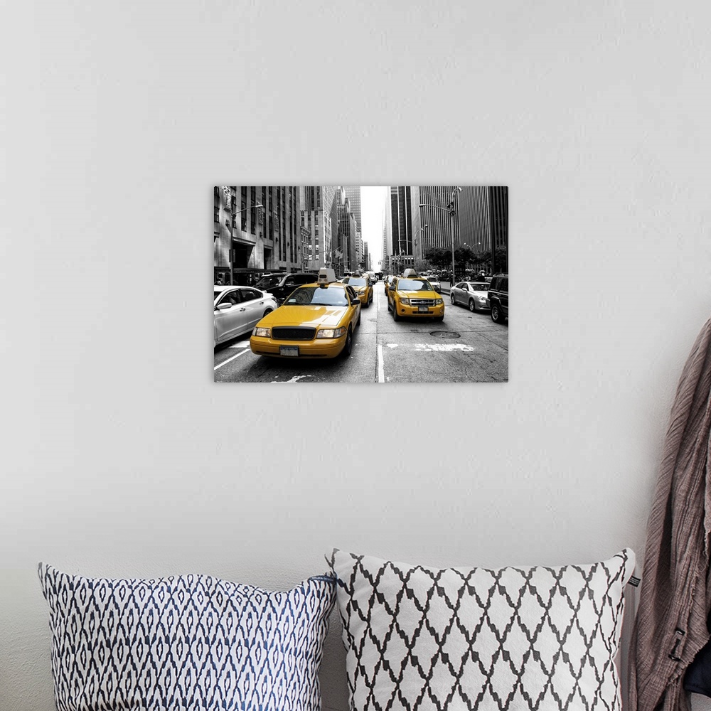 A bohemian room featuring Yellow taxi in a black and white, New York.