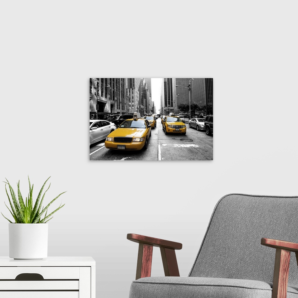 A modern room featuring Yellow taxi in a black and white, New York.