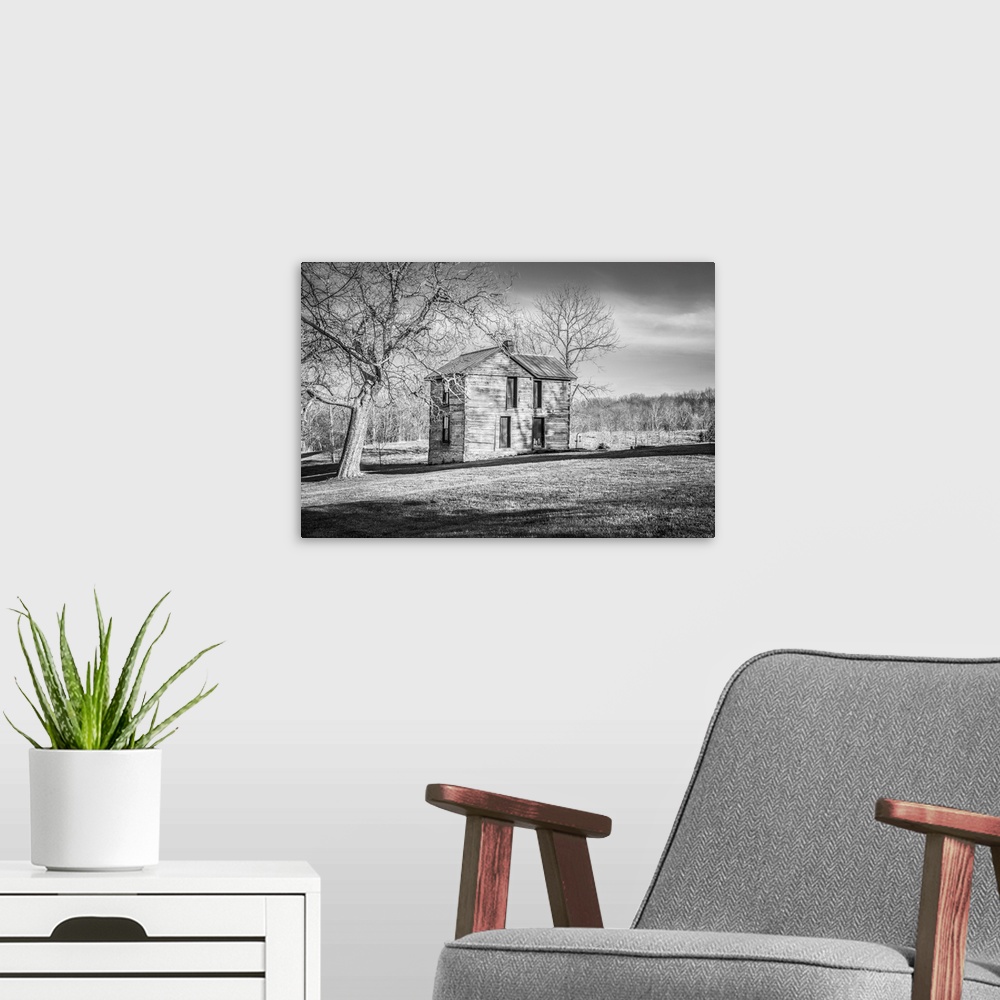 A modern room featuring Black and white image of an old homestead Harrison co. Ky.