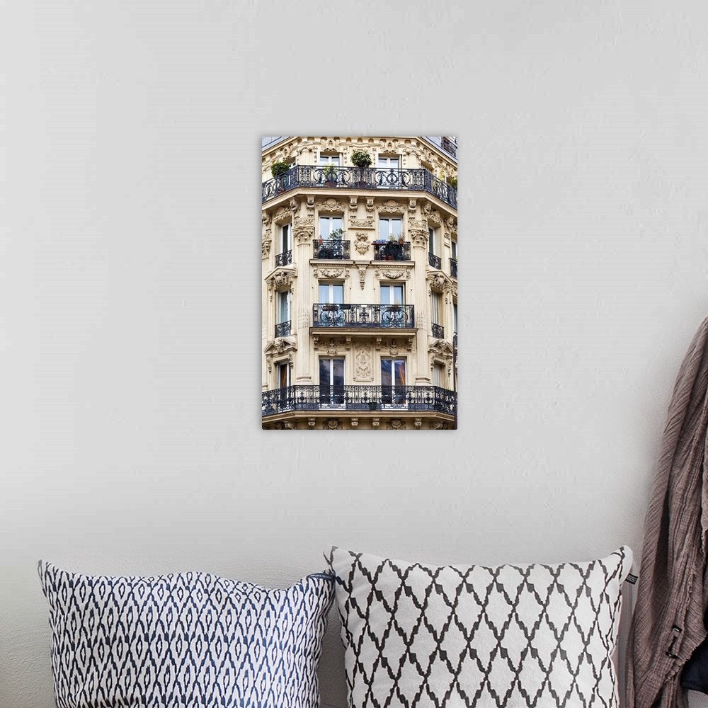 A bohemian room featuring Corner of typical house with balcony in Paris, France.