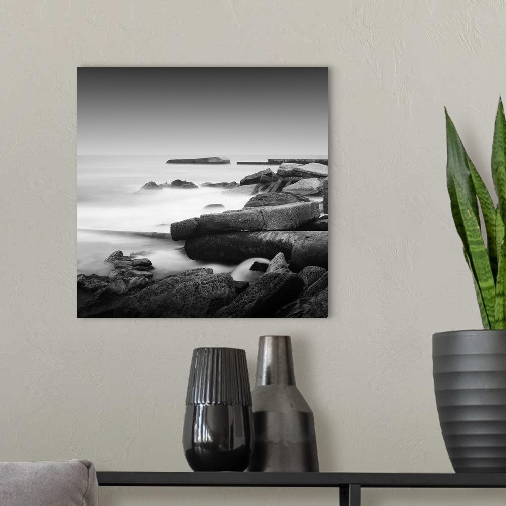 A modern room featuring Noir smooth seascape with objects in the sea. The photo taken in black and white. Black sea, Odes...