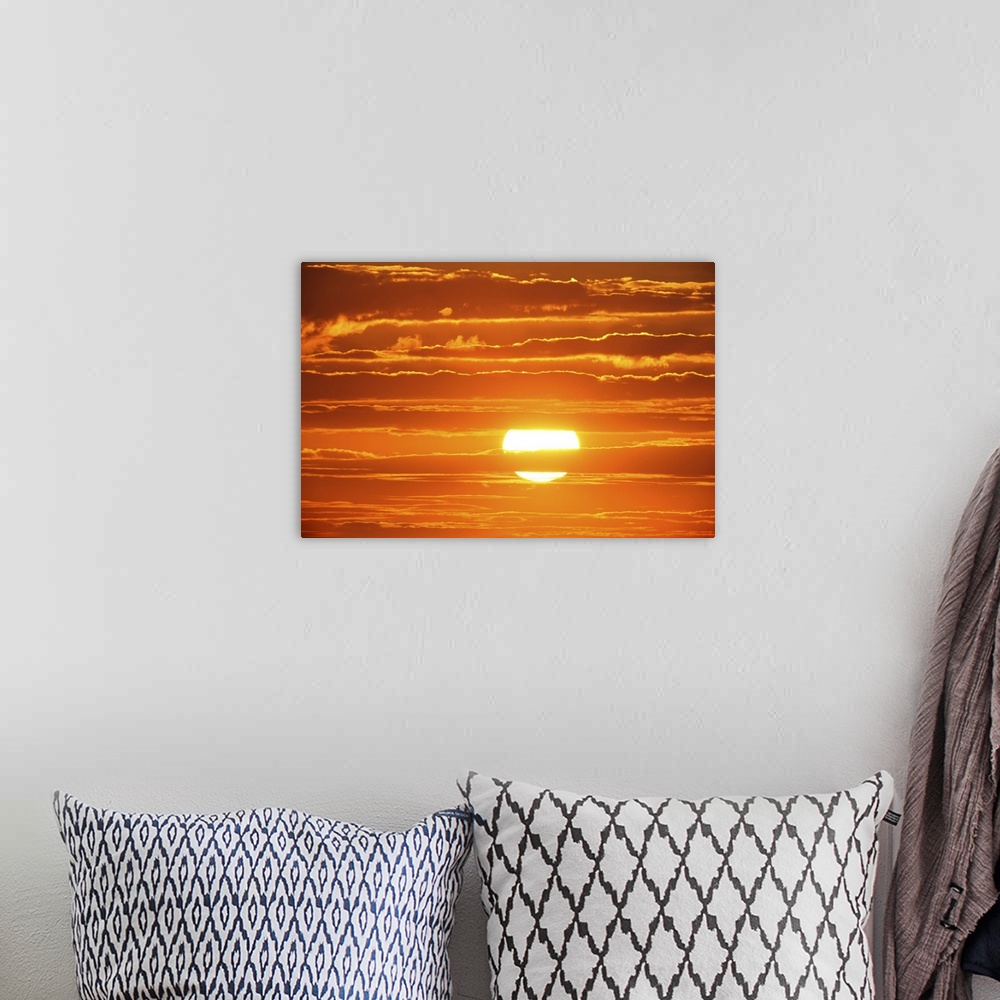 A bohemian room featuring Scenic orange sunset sky background.
