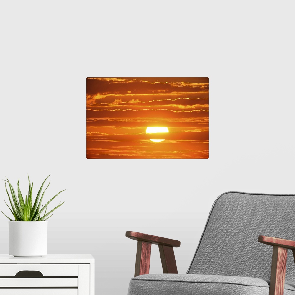 A modern room featuring Scenic orange sunset sky background.