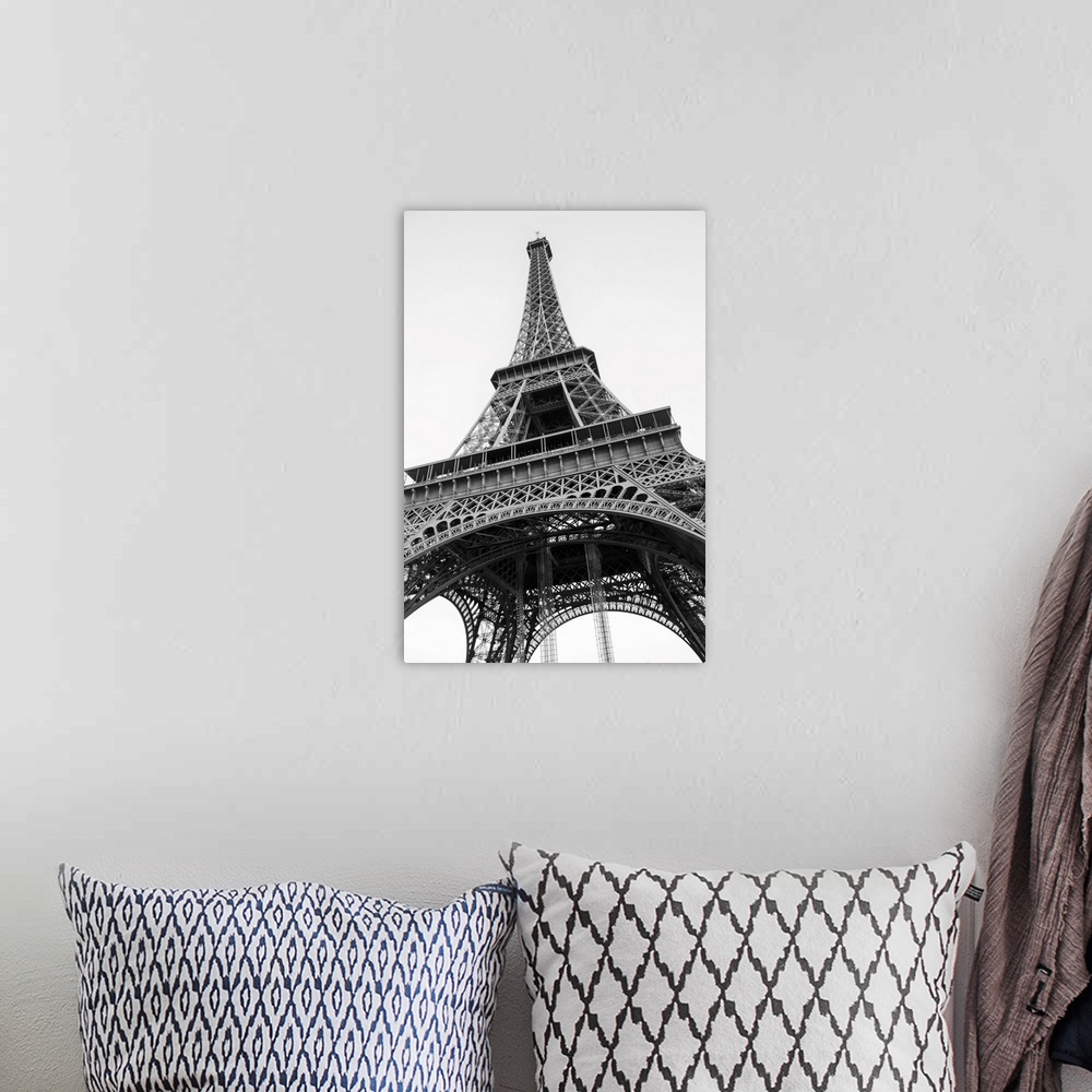 A bohemian room featuring The famous Eiffel tower in Paris. Black and white photo.