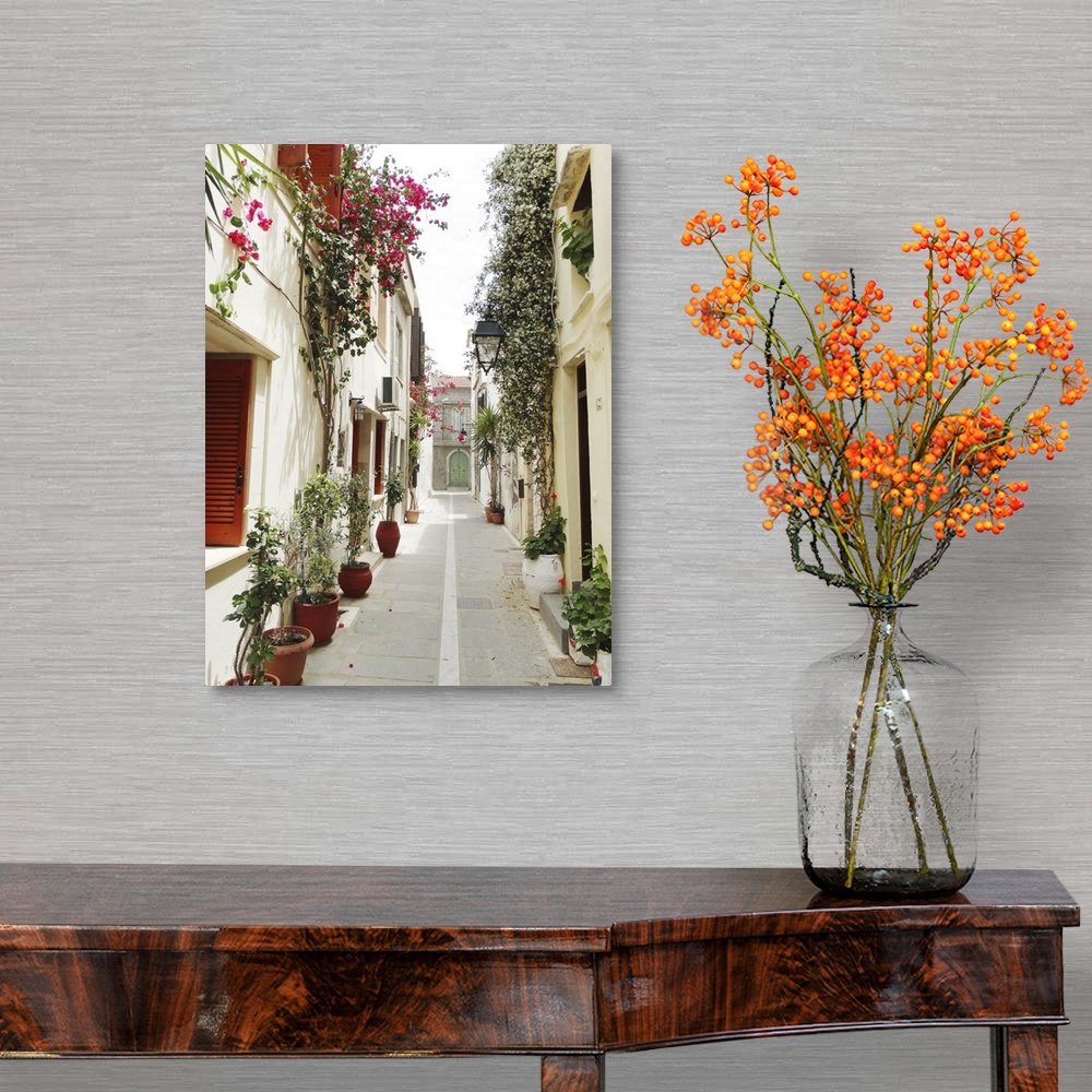 A traditional room featuring Traditional Street Among Bougainvillaea In Rethymno, Greece