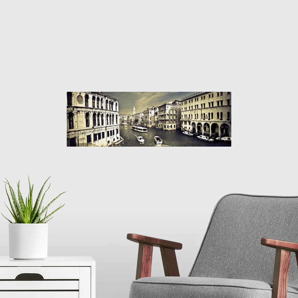 A modern room featuring Panoramic photo of Venice with view on the river.
