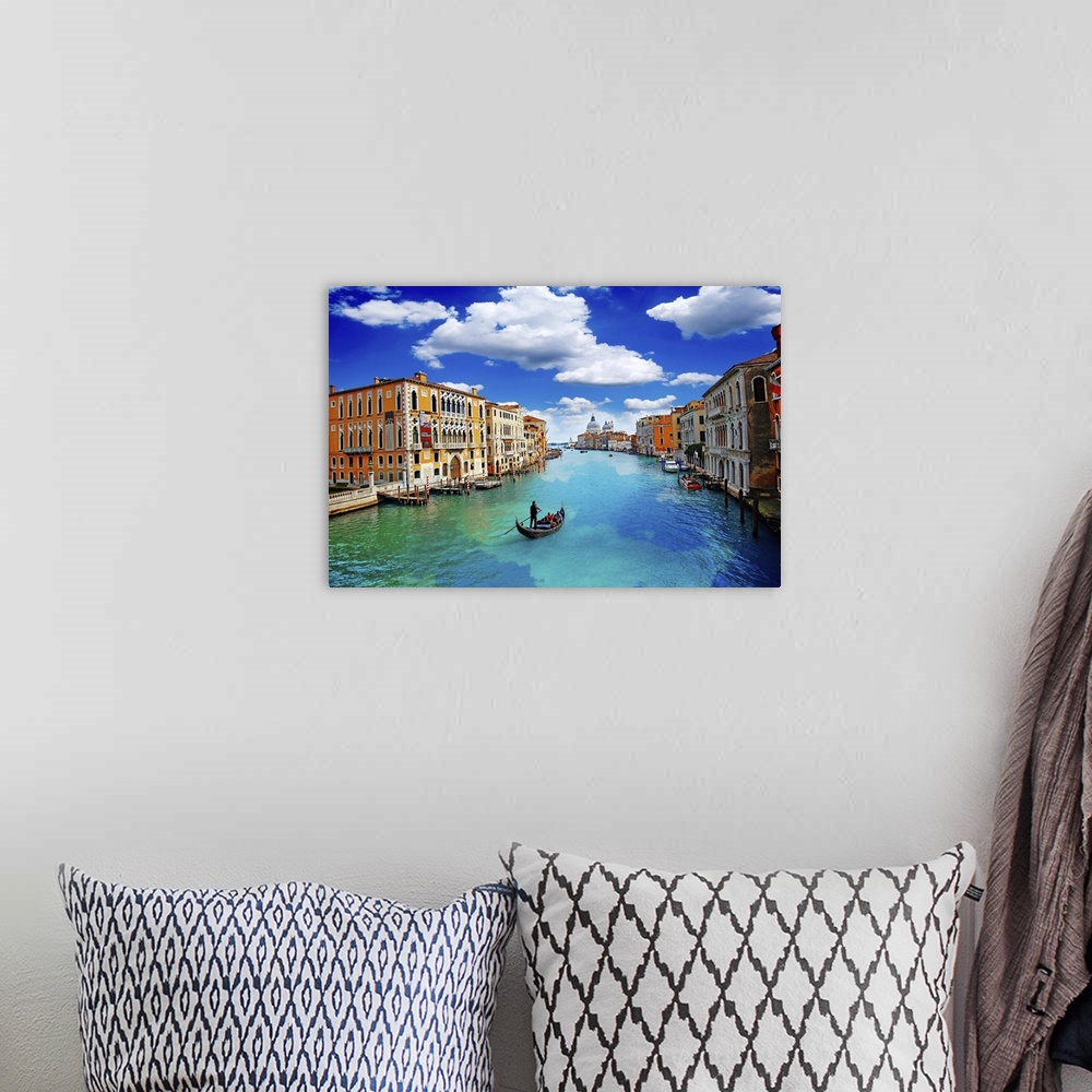 A bohemian room featuring Ancient buildings and gondola along canal grande in Venice Italy.