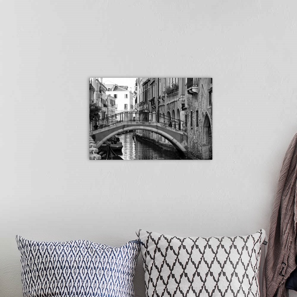 A bohemian room featuring View of  Venice, Italy in black and white.